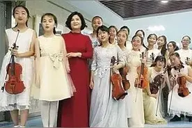 宝藏女孩马奕菲和她的小提琴老师图片
