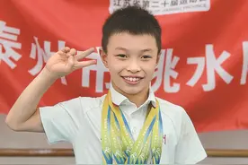8岁泰州男孩5金成为“夺冠王”图片