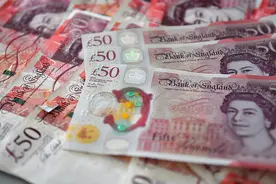 印有伊丽莎白二世头像的英镑将继续作为英国法定货币流通图片