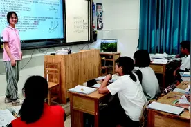 桂林一中学的高中班级里，55名学生设置35个班干部岗位图片