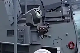 央视镜头曝光，055上疑似激光武器的设备，海上对峙中的王牌装备图片