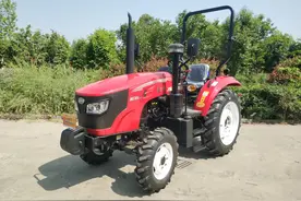 东方红ME704-N轮式拖拉机性能详解，一台站在风口的猪图片