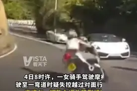 #女骑手压弯失控撞上兰博基尼，空中翻滚3圈后重摔落地，目前已被送往医院救治图片