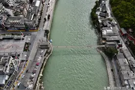 红军走过的泸定桥，虽然如今保护措施齐全，但走上去依旧心惊胆战图片