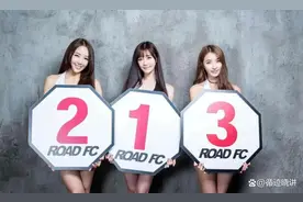 举牌女郎穿得‘骚’，咱们要不要管管？图片