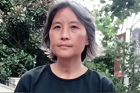 上海一女子流浪街头，风韵犹存气质引人注目，“曾经是个女强人”图片