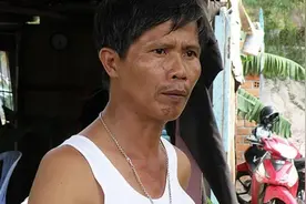 越南一位普通农民，养育了100个孩子，也亲手埋葬了超过2万名婴儿图片