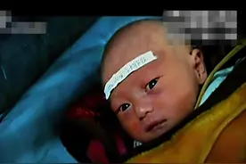 2010年，湖南新生宝宝“无肛无肠”只活9天，父母含泪捐献眼角膜图片