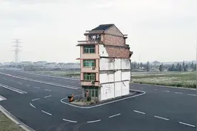 上海最牛钉子户霸占路中间14年，要价1个亿6套房，最后结局如何？图片