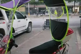 该不该拆除电动车雨棚？图片