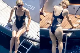 41岁希尔顿在海中甜吻丈夫！穿镂空泳衣，清晰的肌肉线条令人意外图片