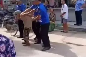 发文三城管“搀扶”老人后续图片