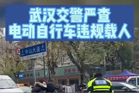 电动自行车违法载人安全隐患多 武汉交警严查图片