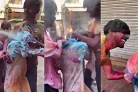 日本女子参加印度洒红节，被一群男子又摸又抱，嬉皮笑脸肆无忌惮图片