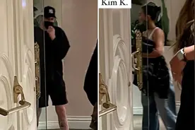 41岁金·卡戴珊酒店约会28岁男友被偶遇，穿纯白背心，二头肌健美图片