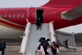 深圳航空ZH9138航班18日突返航，停机后释放逃生滑梯；深航通报：系客舱出现烟雾，机组按程序处置图片