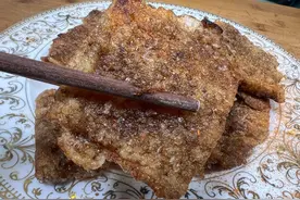 安阳特色煎皮渣的家常做法来啦，小火慢煎，外皮焦香，里面软糯图片