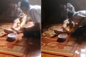 亲大腿点蜡烛，老挝一地区的祛病驱邪方式引争议图片