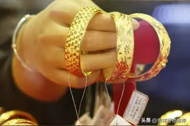 黄金用打火机烧一下变黑了是真金么?烧一下变黑了擦不干净怎么办?图片