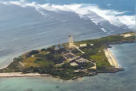 永兴岛上树木茂盛，房屋都遮蔽在树林深处，外国人不能进图片