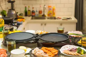 电煎锅和电饼铛哪个更实用？电煎锅和电饼铛的区别有哪些？图片