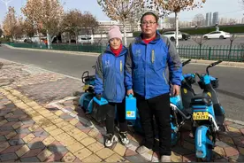 春节共享助力车换电夫妻档：同心坚守，共赴美好图片