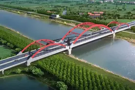 监利首座系杆拱桥全速推进图片