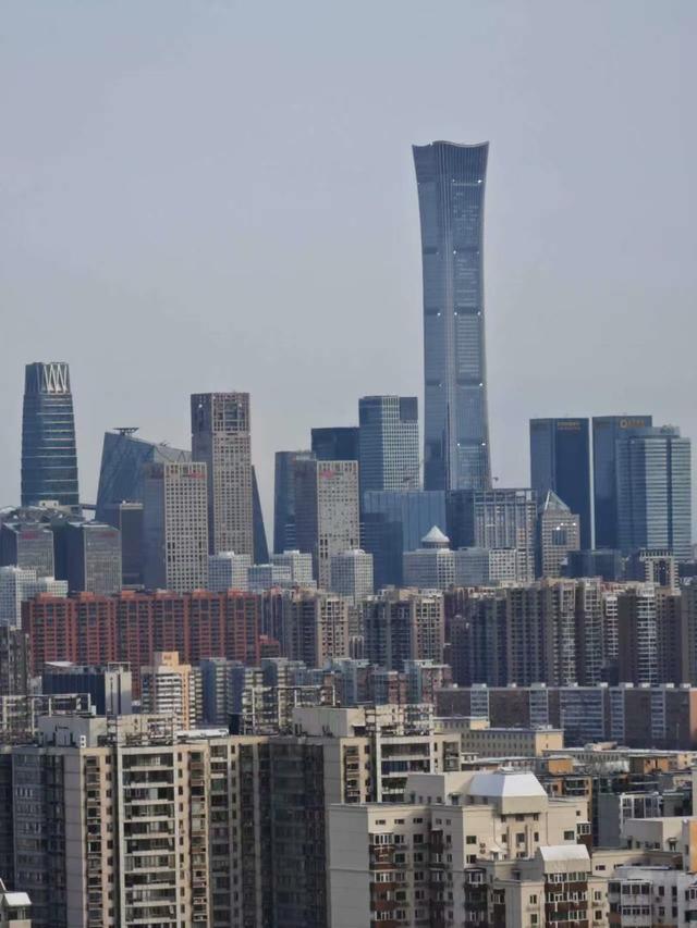 雪后天坛和天安门“同框”，市民出门赏雪忙