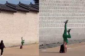 韩媒：越南一女子在首尔景福宫练瑜伽引争议图片