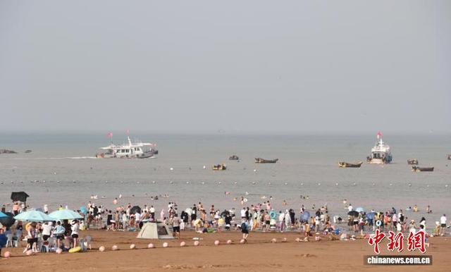 （活力中国调研行）浙南小城有“凉”方：“168黄金海岸”人气足