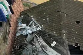 实探暴雨后的贵州三都县：积水退去，商户重新开门，路边存在山体滑坡和塌方危险图片