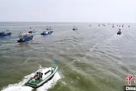 海事部门调派今年北方最大规模执法力量护航黄渤海开渔图片