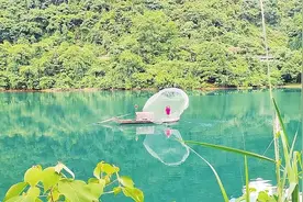 旅发大会给郴州带来了什么｜东江湖上的撒网师傅图片