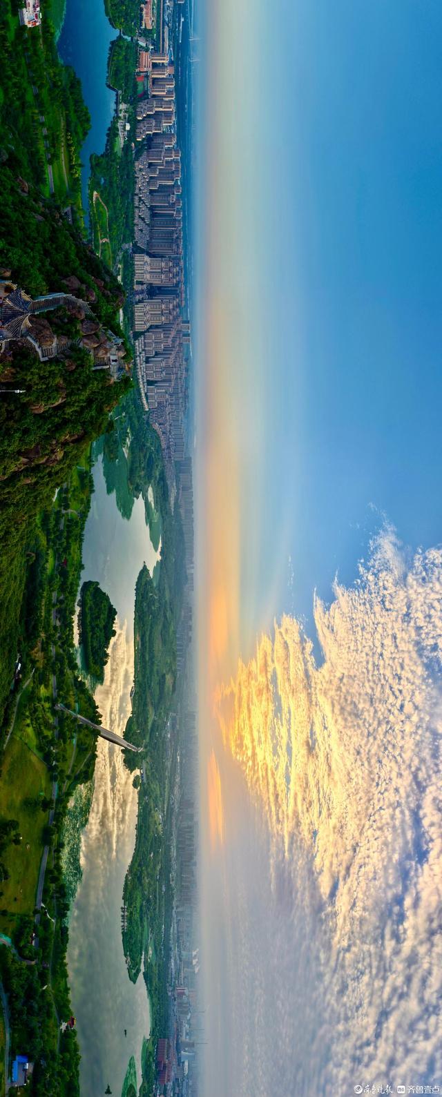 初秋济南天空如画卷，华山湖晨光徐徐展开