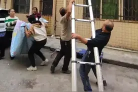郴州幼童被卡防护窗，楼下一幕感动全网：有人扯被防护有人搭梯营救图片