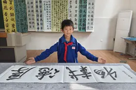 长沙9岁书法少年获评全国“最美新时代小先生”图片
