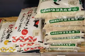 这边背米回家，那边积极出口，日本大米价格一波更比一波高图片