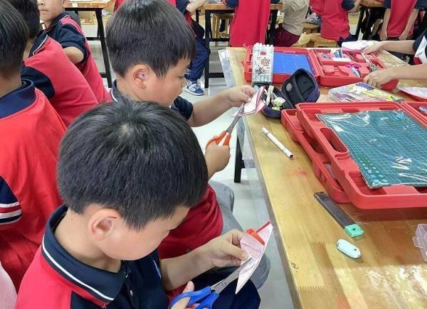 剪纸庆国庆 传承中国红——亳州市第六小学庆国庆剪纸活动