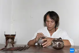 吴名驹获海南椰雕国家级代表性非遗传承人称号 推动椰雕走向广阔舞台图片