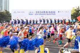 青岛马拉松男子全马刷新赛会纪录 女子全马冠军又是丁常琴 三年前也曾夺冠图片