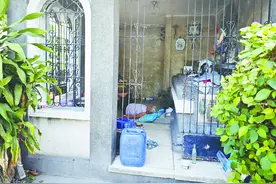 菲墓地贫民窟，生与死“界限模糊”图片