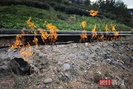 四川乐山一村庄地面起火两月不熄，官方：或为煤层气或浅层天然气，无开采价值图片
