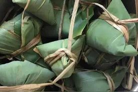 包粽子 赛龙舟 端午节过出“国际范儿”图片