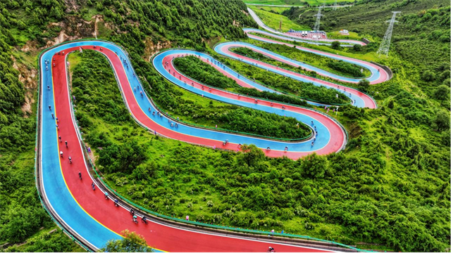 车轮碾过山水间 铺就农体文旅融合新篇