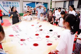 之江同心石榴红，余杭中泰各族群众喜迎国庆图片