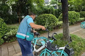 杭州入梅强降雨 共享单车协力保障图片