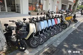 西湖边共享电瓶车渐热，这股风能刮回杭州核心城区吗图片