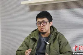 云南白族艺术家以数字水墨塑火莲哪吒：国漫崛起源自多年积淀图片