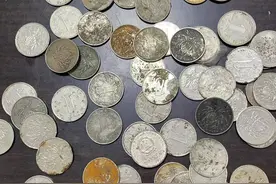 客运站会计抱着800枚“高龄”残损硬币来银行求助，顺利回收750枚图片