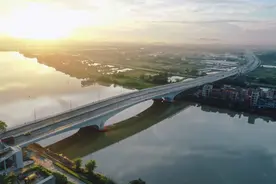 广州国际港首条南北向交通动脉成功贯通 广州白云区黄金围大道正式通车图片